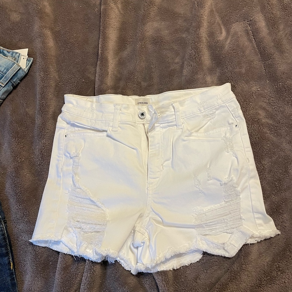 White distressed “jean” shorts that are very elastic